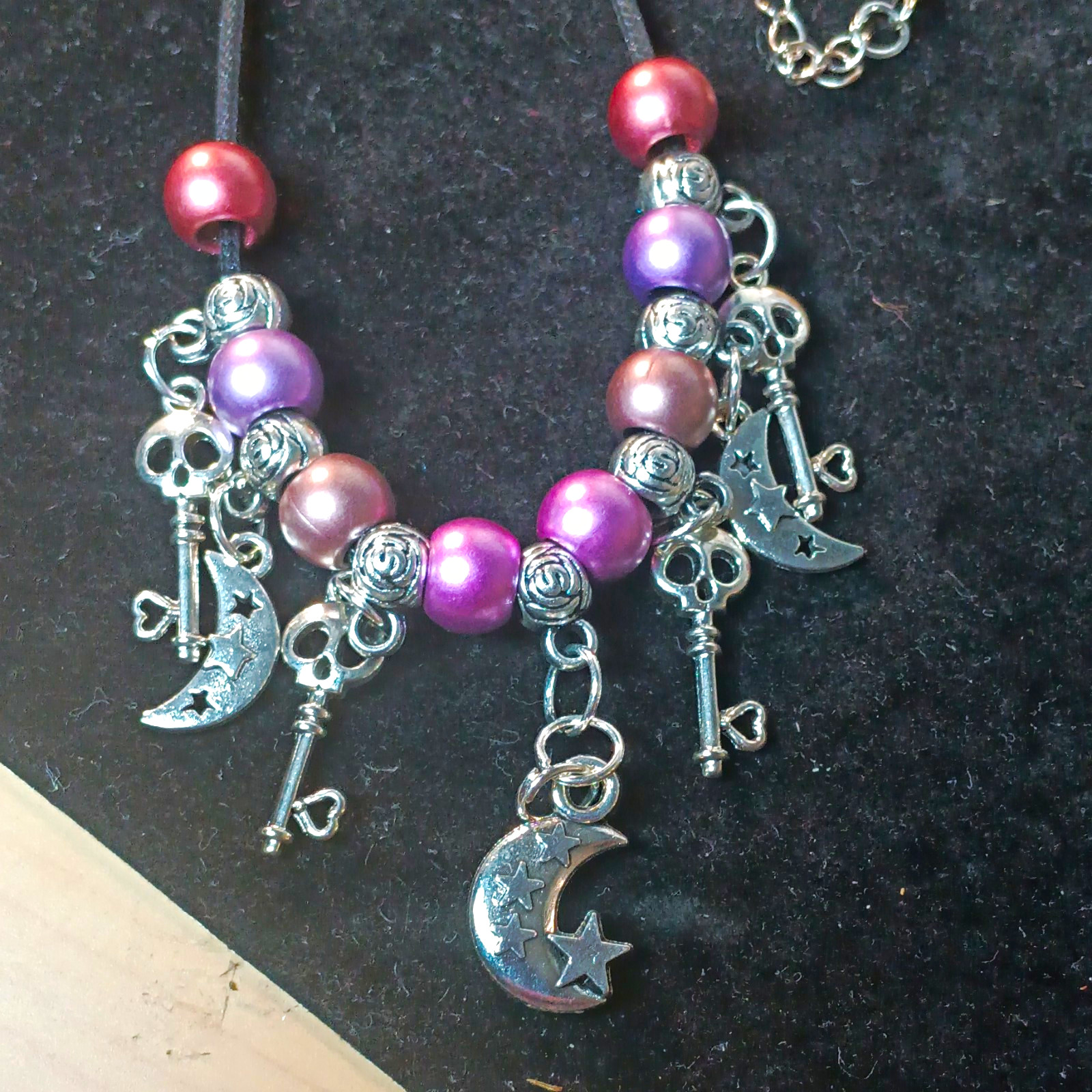 Multicolor Beaded Cord Necklace With Crescent Moon & Skull Key Charms
