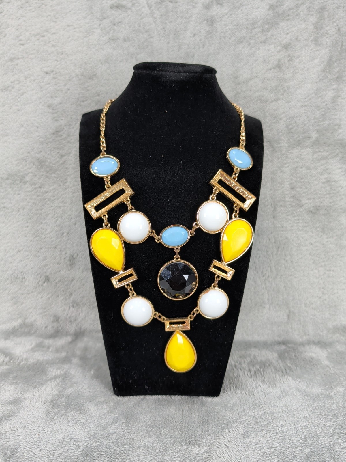Goldtone Bib Necklace Yellow White And Blue Pendants